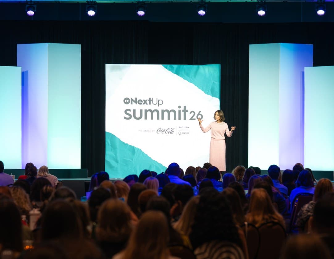 Suzy Welch speaking to an audience